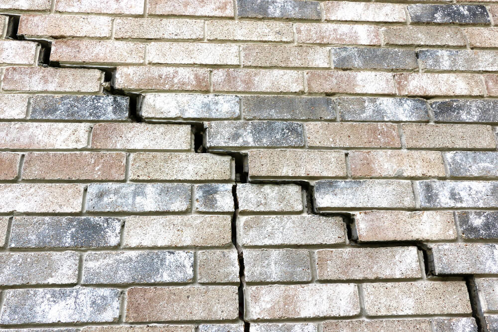 Foundation Crack in the brick of a house found by a Palm Springs Home Inspection Company